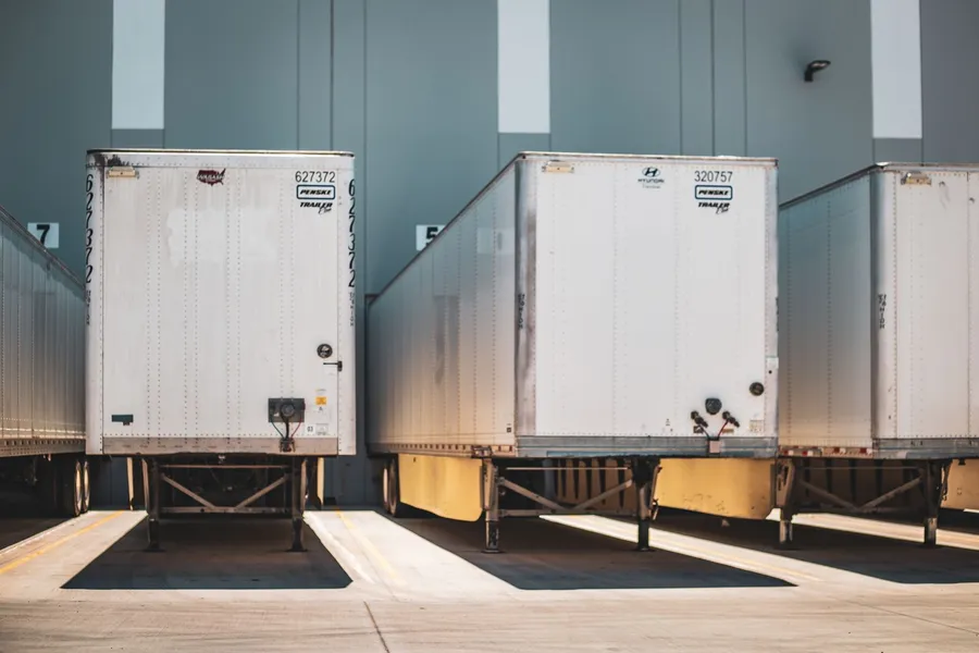Freight trailers parked at a commercial loading dock